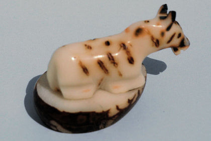 Carved tagua (vegetable ivory) animals