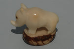 Hand carved tagua animal