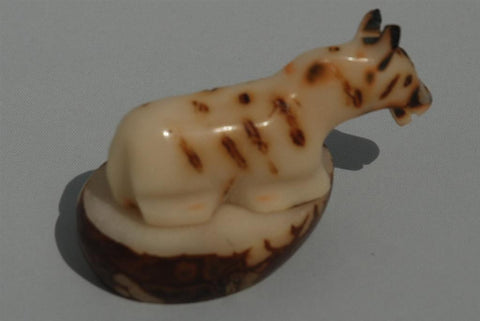 Hand carved tagua animal