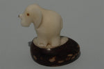Hand carved tagua animal