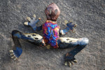 Recycled tin leaping frog